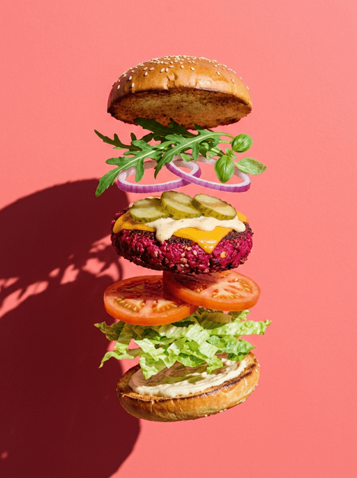 AI product photography scene — food deconstructed beet burger floating pink | rawbit AI product photography scene — food deconstructed beet burger floating pink | rawbit